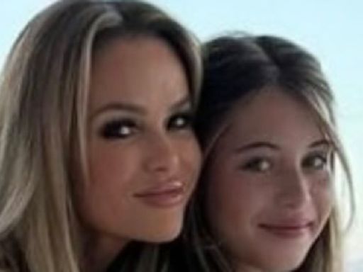 Amanda Holden stuns with mini-me daughters Lexi and Hollie in Greece