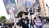 SAG-AFTRA Hits Picket Line At Warner Bros. Demanding “Baseline Of Respect” From Major Video Game Companies