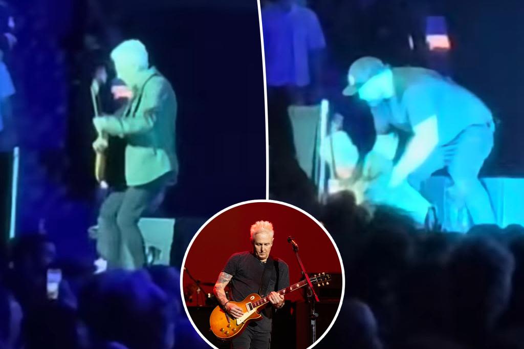 Pearl Jam’s Mike McCready falls off stage mid-solo