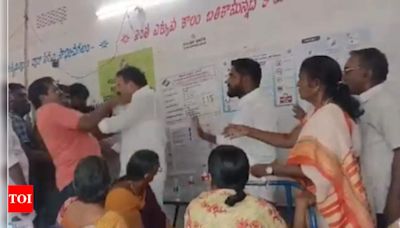 Watch: YSRCP MLA Sivakumar slaps voter at polling booth in Andhra Pradesh, gets it back | Vijayawada News - Times of India