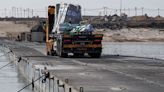 Gaza pier resumes operations as aid collects in marshalling area