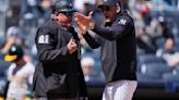 Yankees manager Aaron Boone ejected after fan mouths off to home plate umpire