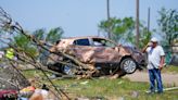 In a north Texas county, dazed residents sift through homes mangled by a tornado