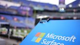 Microsoft sinks, chipmakers climb as AI rally faces divide