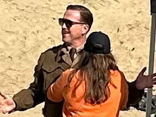 Damian Lewis looks unrecognisable with a thick moustache on set