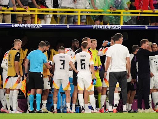 Germany v Denmark clash delayed for 24 minutes by thunder and lightning