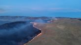 California firefighters continue battling wind-driven wildfire east of San Francisco