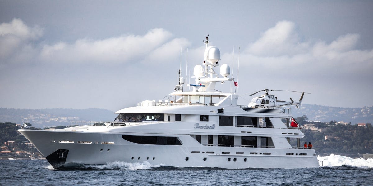 Take a look at the superyacht the Jefferies CEO just bought from the Houston Rockets' billionaire owner