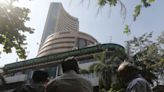 Sensex, Nifty settle flat after hitting fresh all-time highs