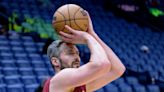 Cavs, Kevin Love finalize buyout; Love tweets he'll sign with Heat