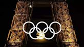 Magic in Paris: Moon perfectly nestles in Olympic rings at Eiffel Tower - Rare moment