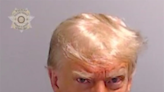 Trump touts Georgia mug shot on Truth Social