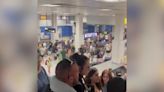 Large crowds at Manchester airport baggage claim after major power cut