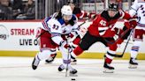 Rangers score three goals late to beat Devils, 5-3