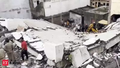 Seven bodies recovered from collapsed building in Surat; woman rescued alive - The Economic Times