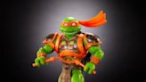 Mikey Shows Off His Inner He-Man with Mattel’s Turtles of Grayskull