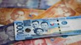 Philippine Peso Declines Past Key 57-Per-Dollar Level