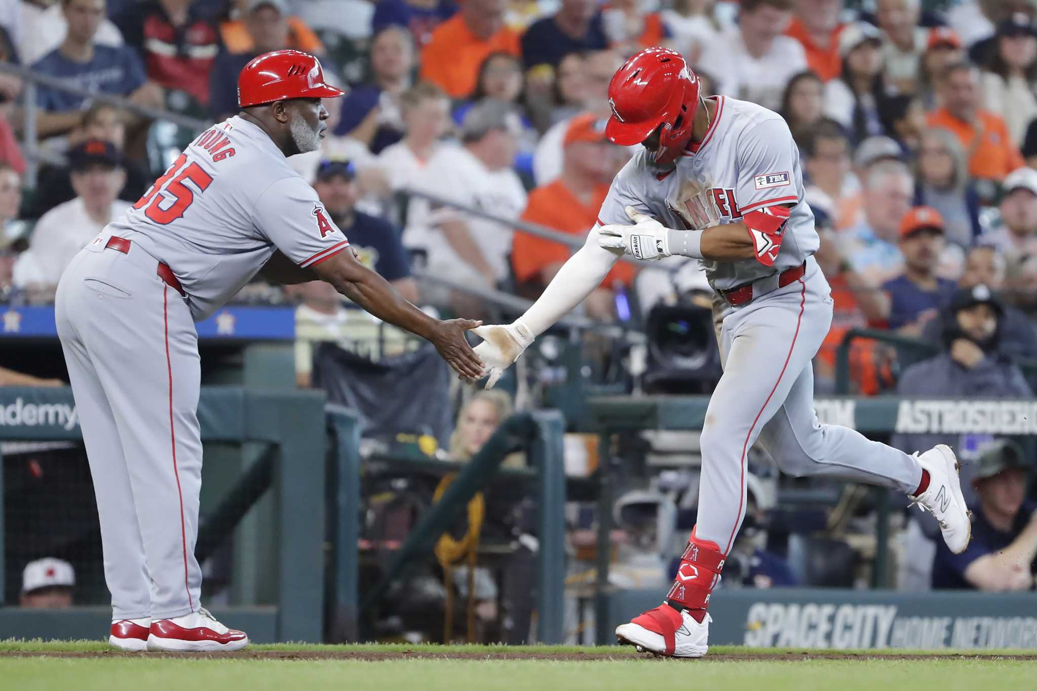 Paris gets his first MLB homer on a 2-run shot to lead the Angels to a 2-1 win over the Astros
