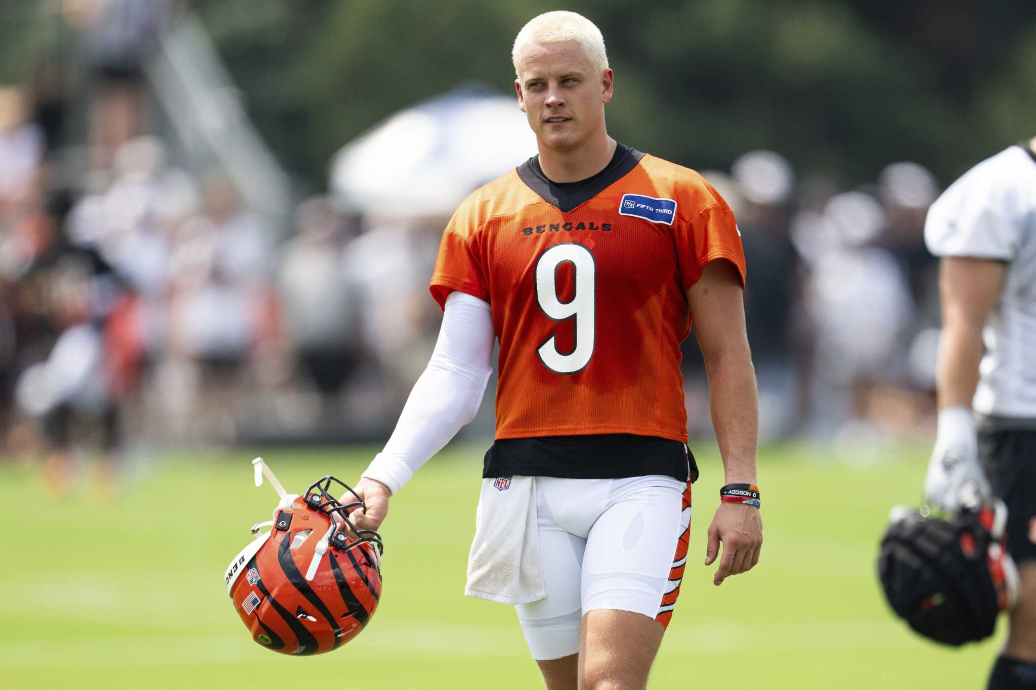 With hair newly cut and dyed, Bengals QB Joe Burrow says his wrist feels good as training camp opens