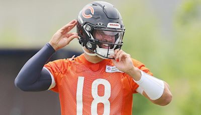 Bears' Caleb Williams signs rookie contract; franchise tag clause held up Chicago's deal with QB, per report