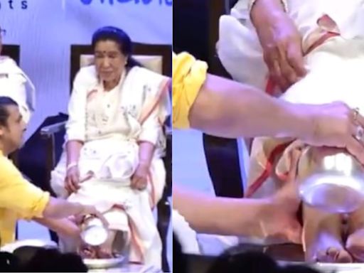 Sonu Nigam washes Asha Bhosle’s feet at her biography launch, netizens find it ‘quintessentially Indian’. Watch