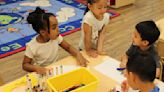 More companies offer on-site child care. Parents love the convenience, but is it a long-term fix?