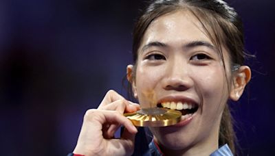 Taekwondo-Thailand's Panipak wins historic flyweight gold