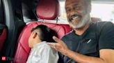 Rajinikanth escorts unwilling grandson to school, pictures go viral