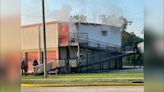 Firefighters battling blaze at storage unit complex along South Harrells Ferry Road; traffic building