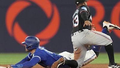 Myers drives in five runs, Marlins limit Blue Jays to four hits in 8-1 romp