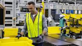 As Amazon's robot ranks swell, workers worry about their future