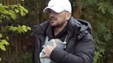 Proud new dad Peter Andre takes daughter for a walk after revealing her name