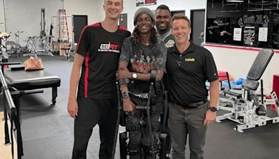Watch as paralysed tennis player walks with help of robot exoskeleton