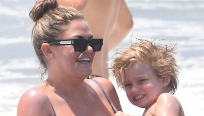 Brittany Cartwright splashes around on the beach with son Cruz, three