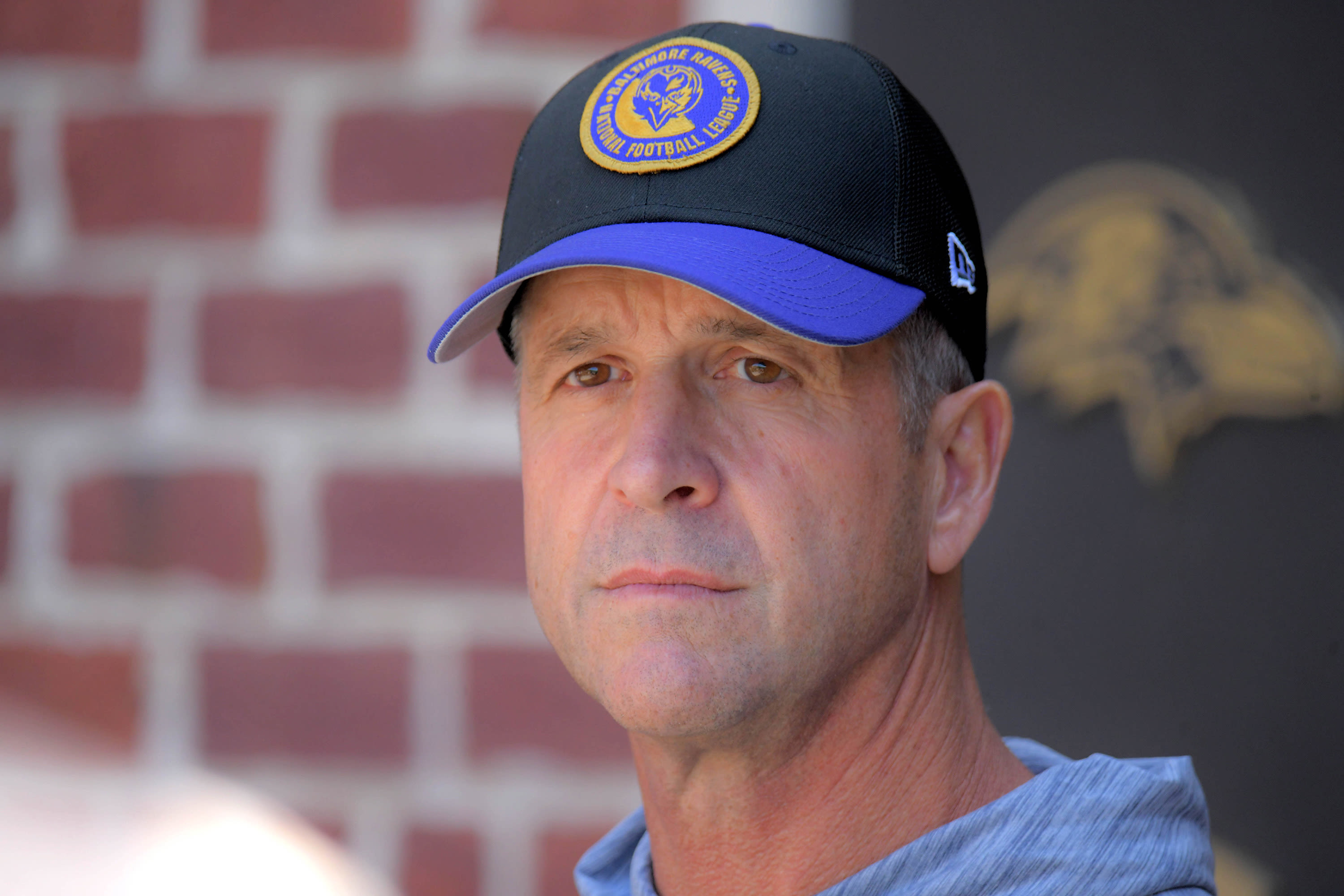 How waves and a bridge help Ravens coach John Harbaugh juggle grief and football