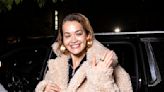 Rita Ora beams as she returns to her NYC hotel ahead of the Met Gala