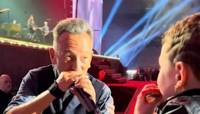 Harmonica kid: Bruce Springsteen gives young Syracuse fan a special moment, and souvenir