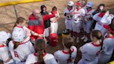 Centennial Softball team rallies around their head coach