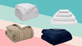 Feather your nest with cozy deals on weighted blankets, blackout curtains and bath sets, from $10