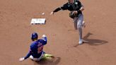 ...throws to first base to get the double play after getting the force out on Mark Vientos of the New York Mets during the fourth inning at Citi Field on Sunday, June 2, 2024, in New...