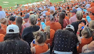 Shocking! Toddler Appears To Sip Beer During Texas Football Game As Mom Turns Blind Eye; Video Goes Viral