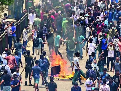32 die in Bangladesh unrest; state TV building set afire - Times of India