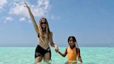 Khloé Kardashian Has Impromptu Photo Shoot with Daughter as They Pose in Tropical Waters: 'Turks and True'