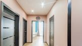 Woman Transforms Boring Hallway With Simple DIY Board and Batten Look