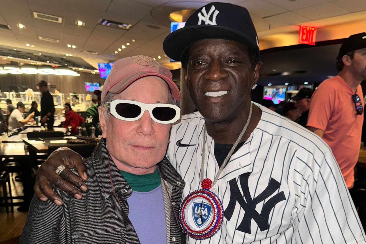 Flavor Flav Meets 'Icon' Paul Simon and Lets Him Try on His Sunglasses: 'This Is a Dream Come True'