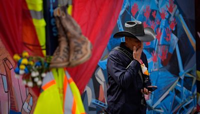 Loved ones await recovery of 2 bodies from Baltimore bridge wreckage a month after the collapse