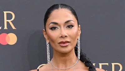 Nicole Scherzinger Shows Off Long Legs in Satin Gown