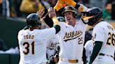 Brent Rooker homers twice in 3rd inning, Athletics roll Marlins 20-4