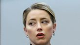 Amber Heard suffered PTSD from 'intimate partner violence' following her relationship with Johnny Depp, expert testifies