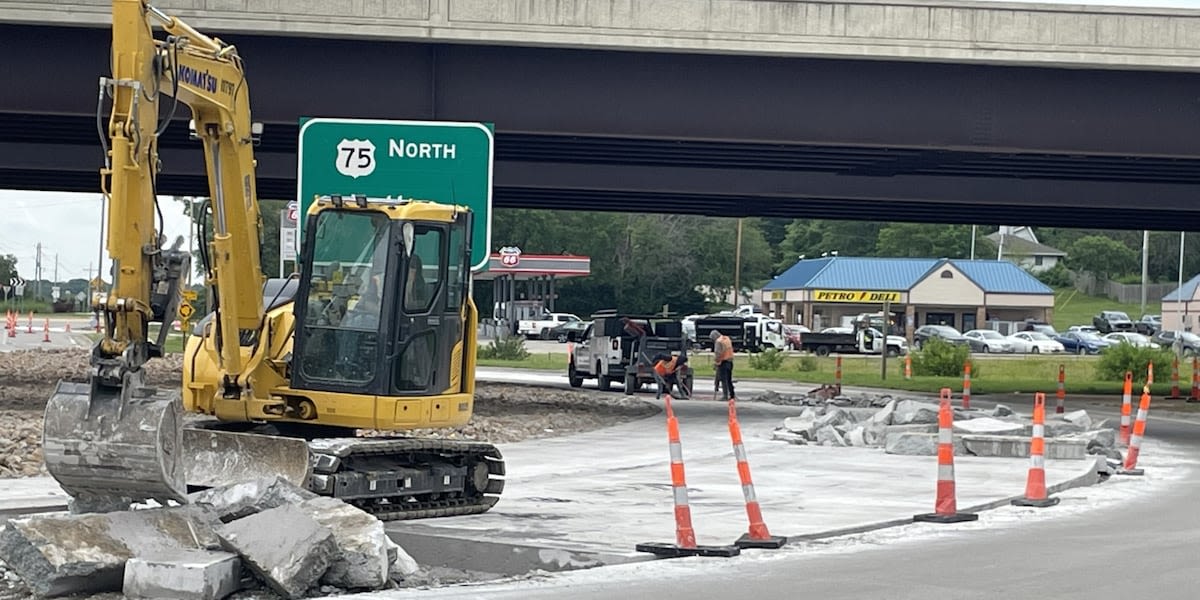 Contractors re-doing concrete panels recently installed on U.S. 75 interchange